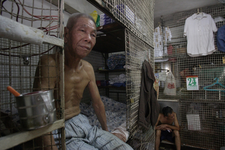 As impressionantes fotografias que retratam as cage homes de Hong Kong