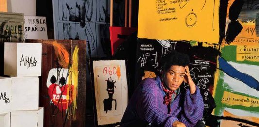 Jean-Michel Basquiat em seu estúdio Great Jones Street, Nova York, 1987