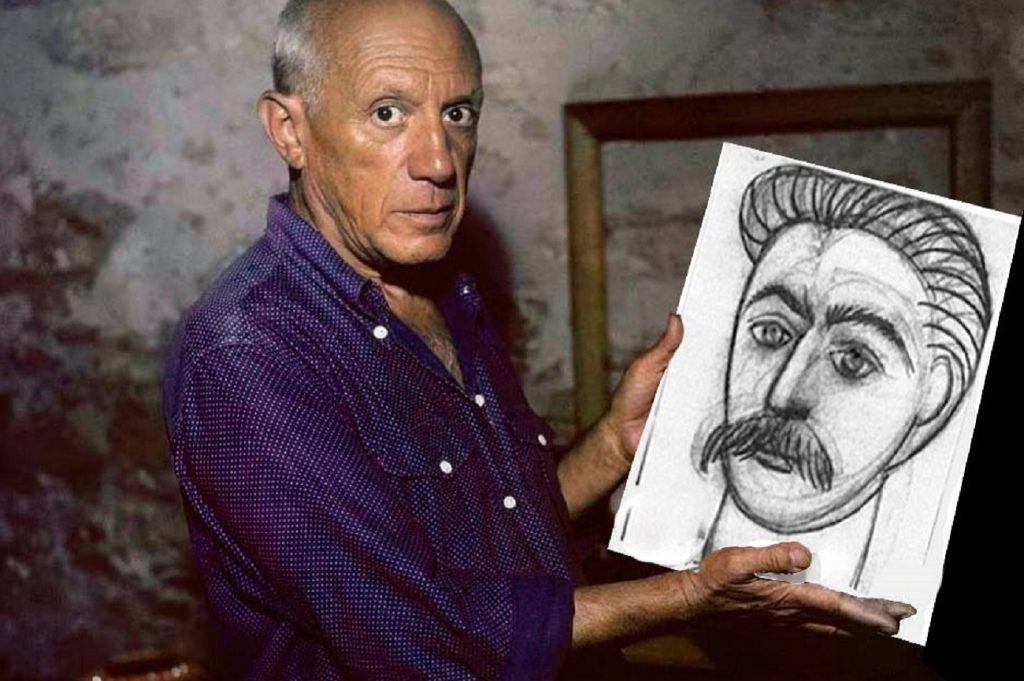 vida política de Picasso: Picasso com seu retrato de Stálin.
