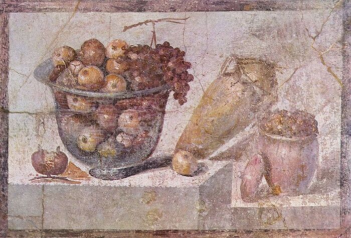 Natureza morta com tigela de vidro com frutas e vasos  (c. 63 e 79 dC) de um pintor desconhecido de Pompeia; Museu Arqueológico Nacional de Nápoles , domínio público, via Wikimedia Commons